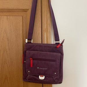 Purple and red Sherpani bag